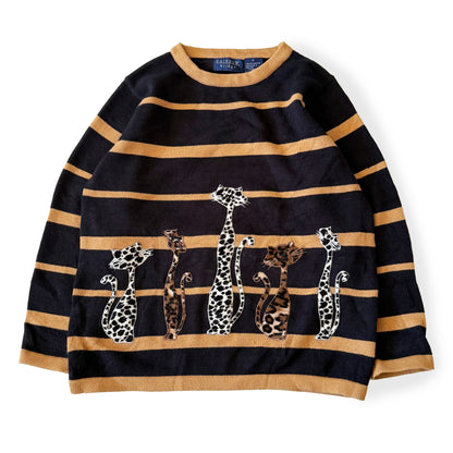 Black and gold striped sweater with embroidered leopards on a white background