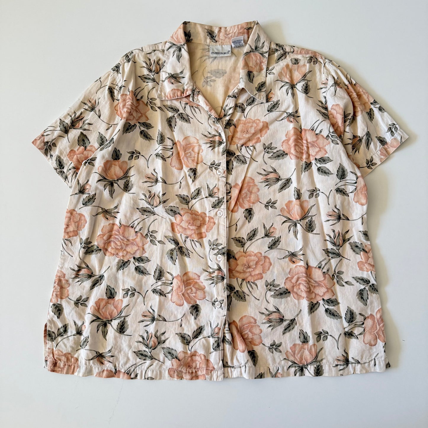 Floral patterned shirt on a plain background