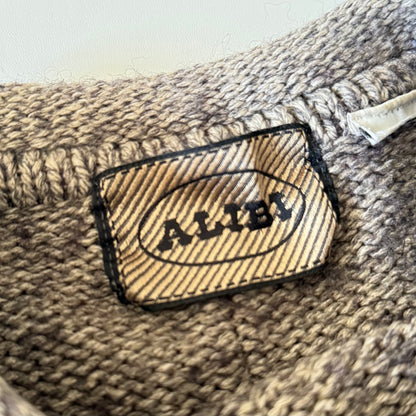 Alibi tag on sweater