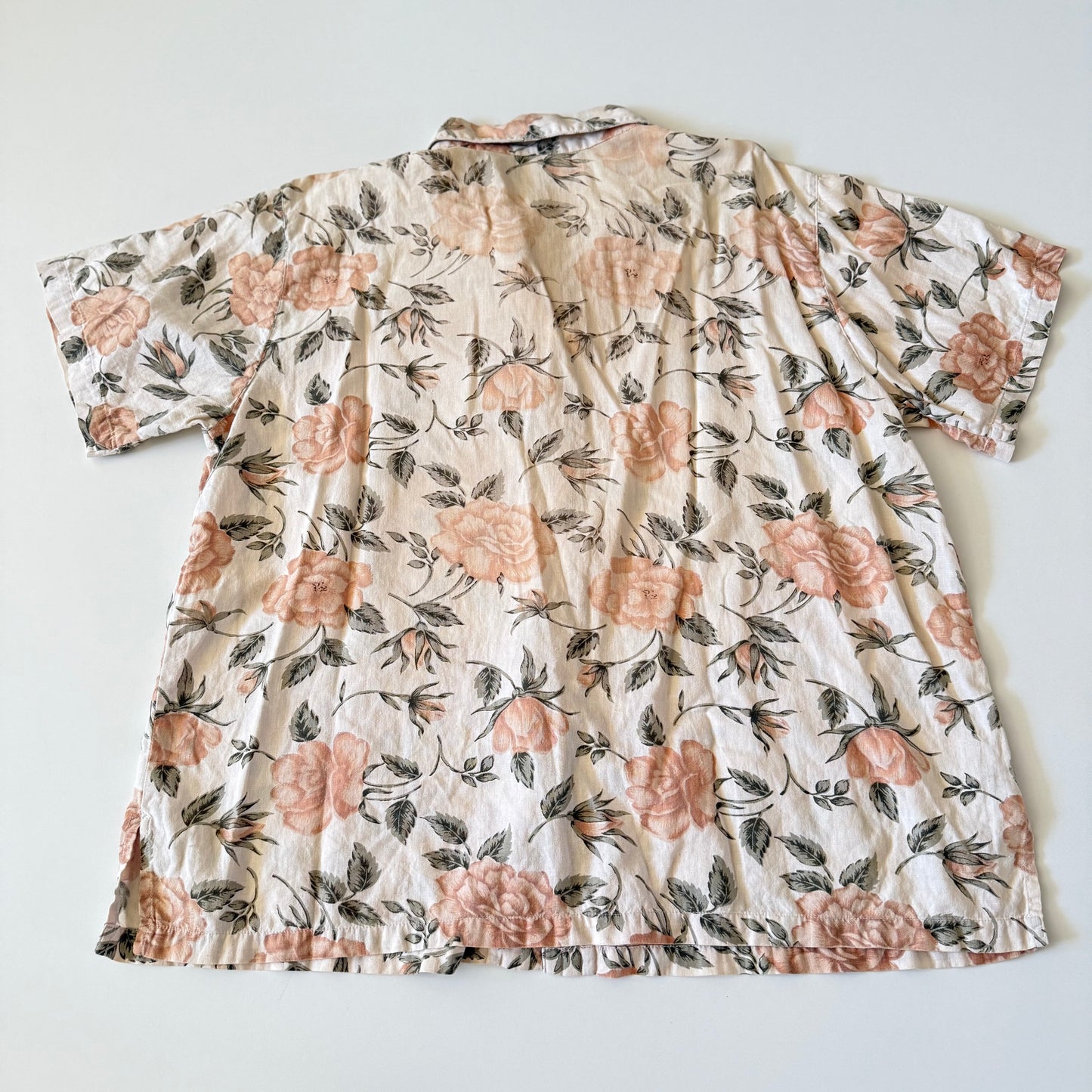 Floral patterned top on a white background