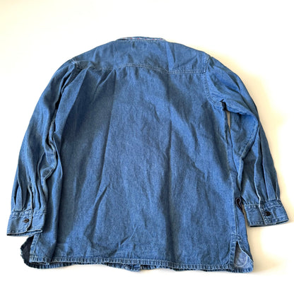 Blue denim jacket on a white background