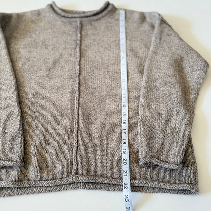 sweater with measuring tape on it