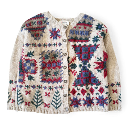 Knitted cardigan with colorful geometric pattern on a white background