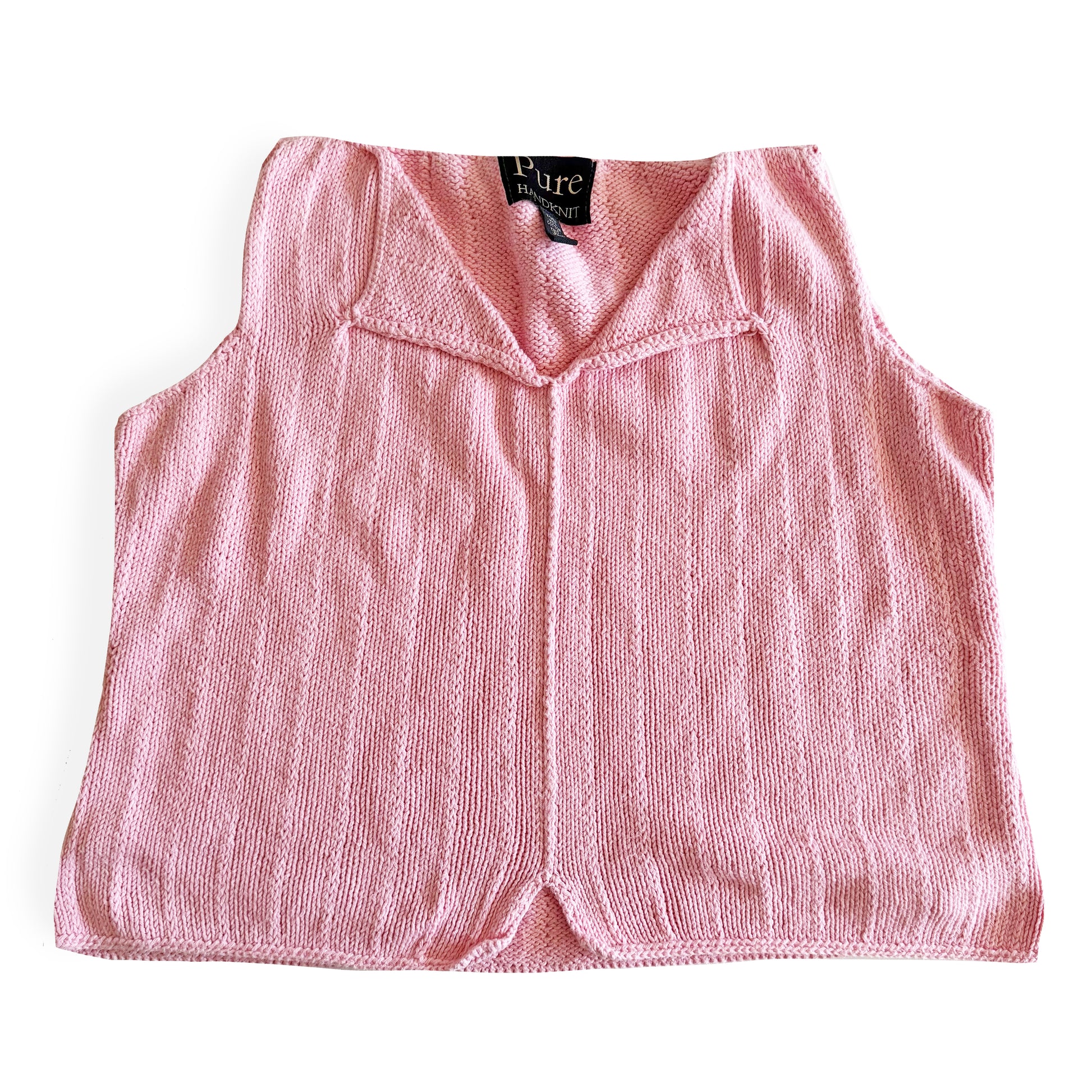 Light pink knit style tank top, with folded out collar opening on a white backdrop. 