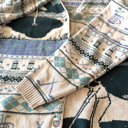 Golf themed sleeve of a cardigan. 