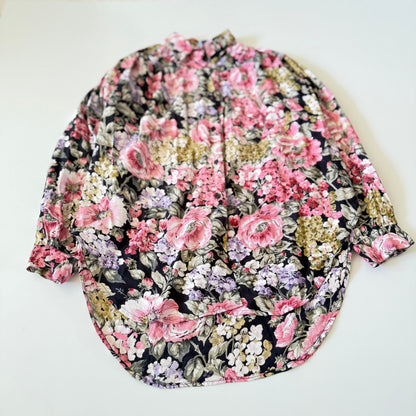 Floral patterned shirt on a white background