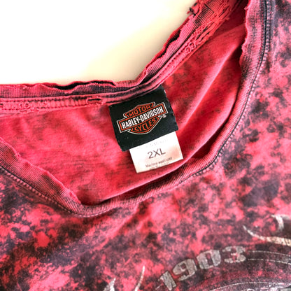 tag of Pinky red t-shirt with black ie dye effect, and the harley davidson logo on the front - on a white background. 