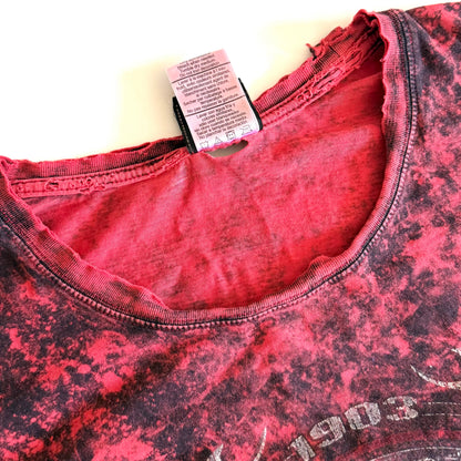 Distristed collar from Pinky red t-shirt with black ie dye effect, and the harley davidson logo on the front - on a white background. 