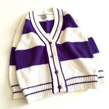 1990's preppy style - purple and white striped cardigan on a white backdrop. 