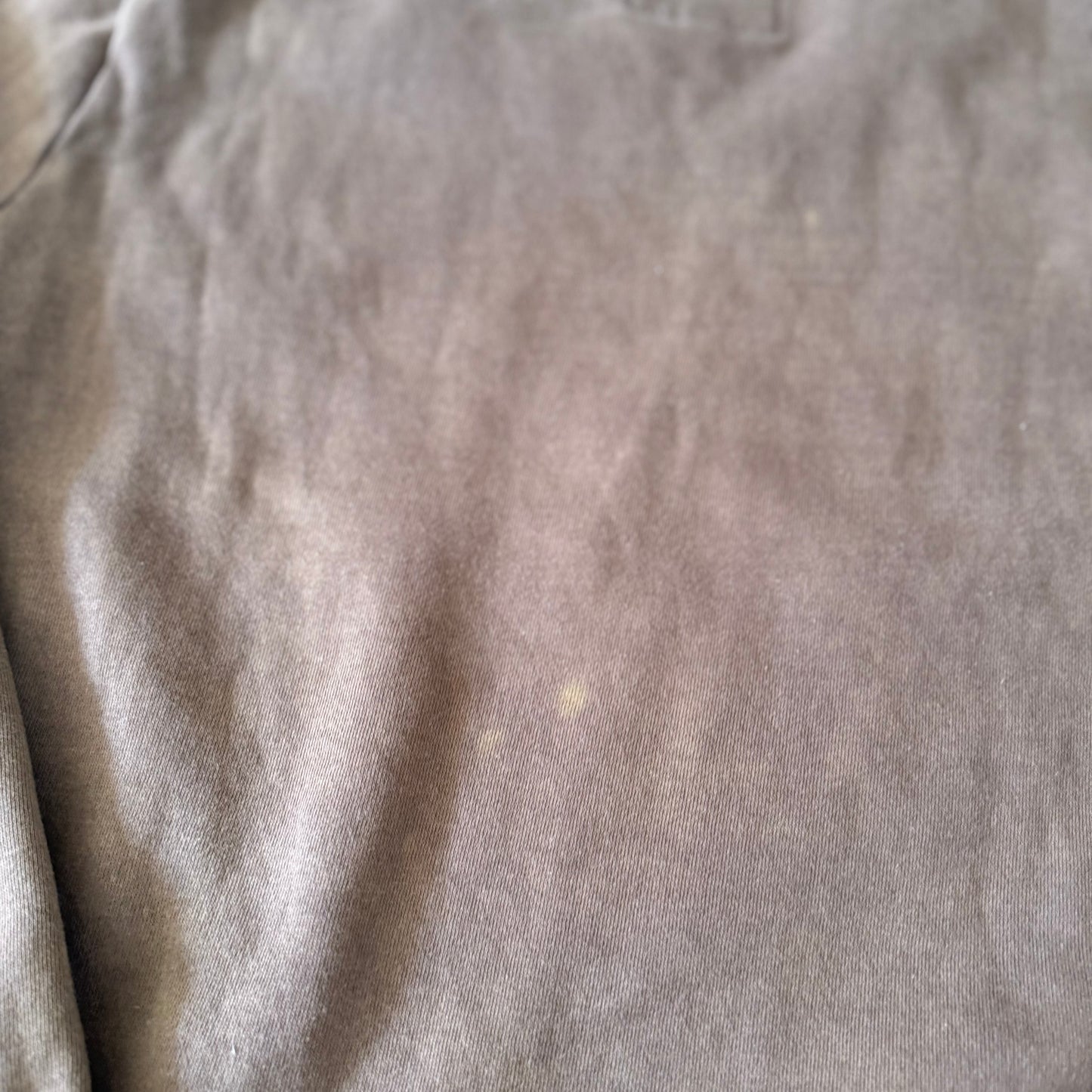 Close-up of a textured gray fabric surface