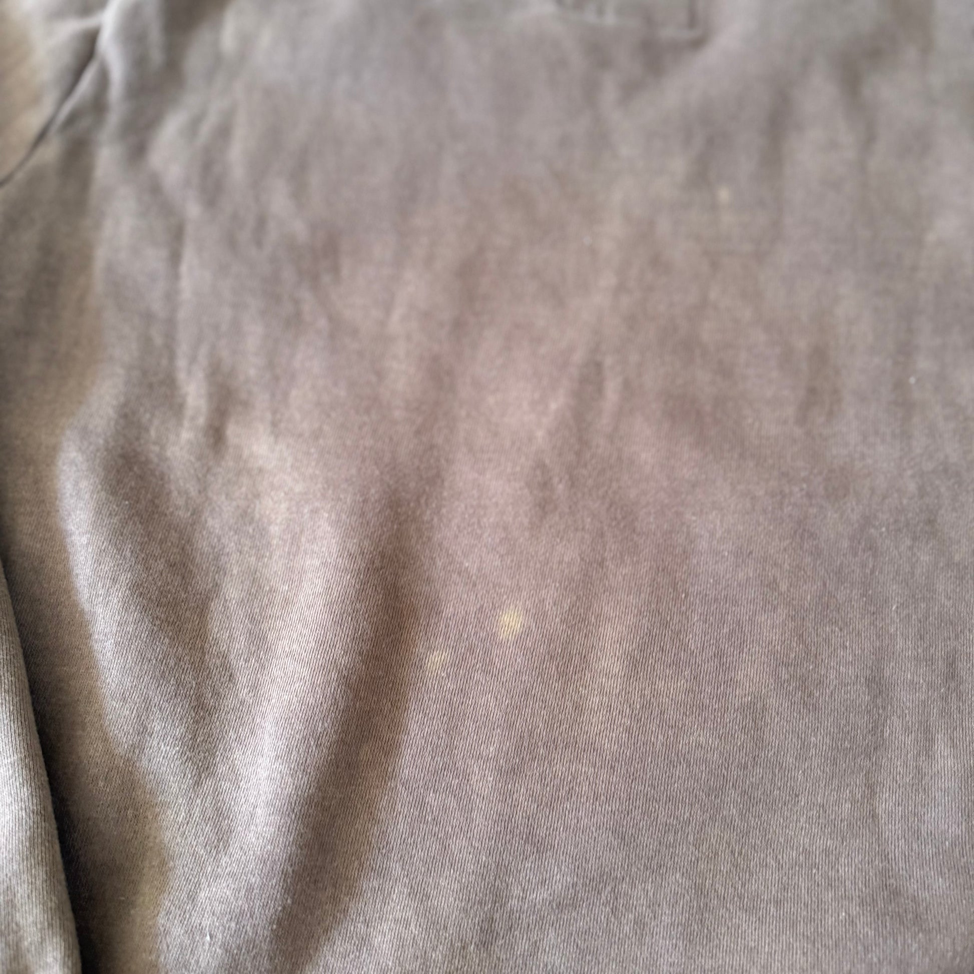 Close-up of a textured gray fabric surface