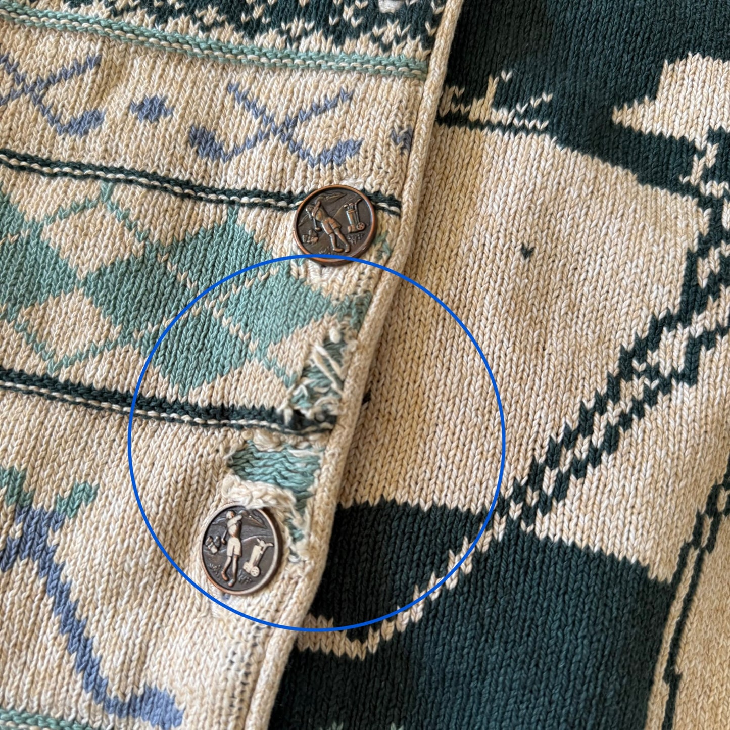 Circle around flaw on cardigan.
