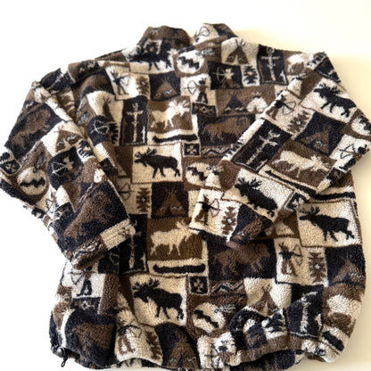 Backside of a moose and other camping motif quarter zip fleece on a white background .