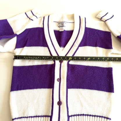 1990's preppy style - purple and white striped cardigan with a measuring tape on it on a white backdrop. 