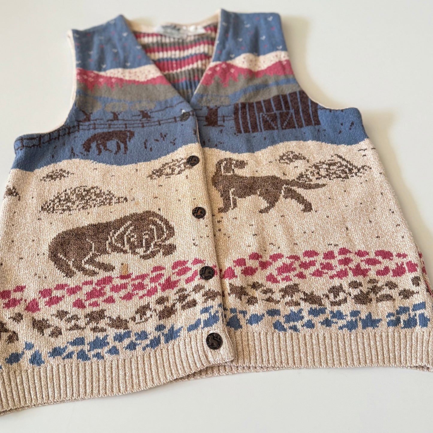 Knitted vest with animal patterns on a white background