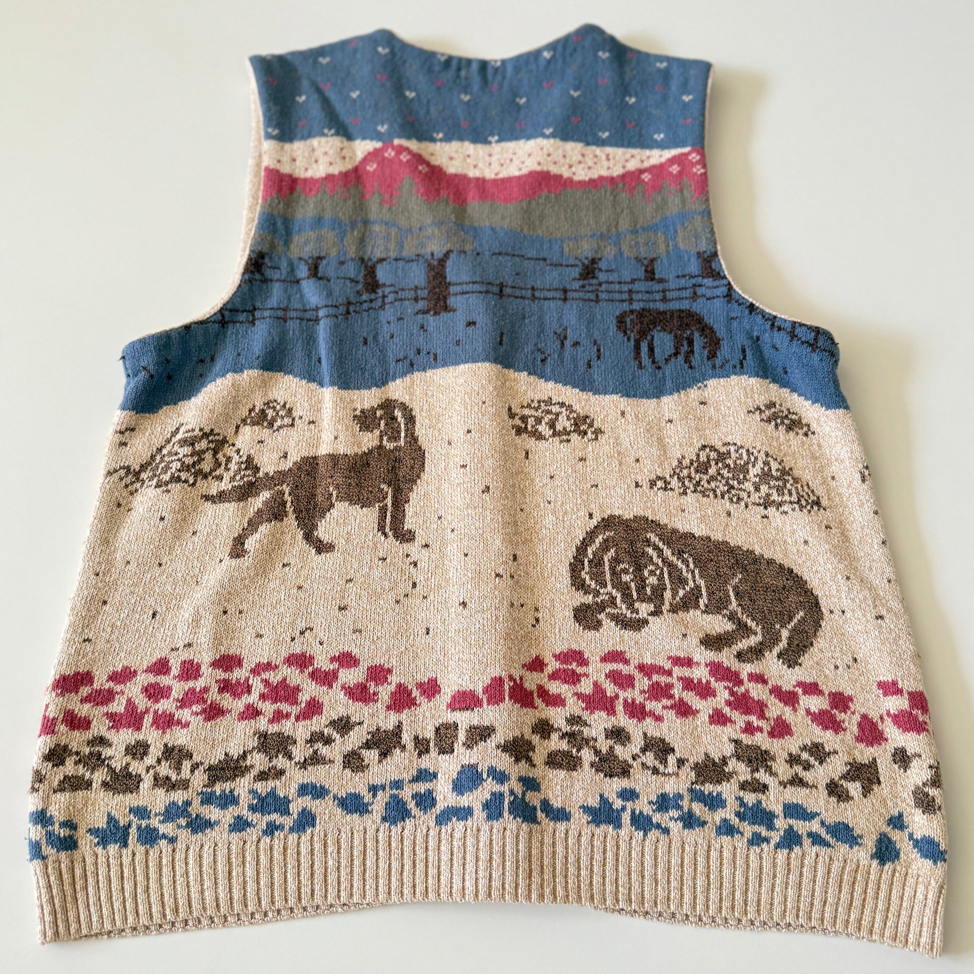 Knitted vest with animal pattern on a white background