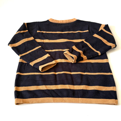 Black and beige striped sweater on a white background